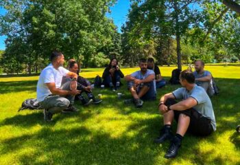 group-relaxing-in-park
