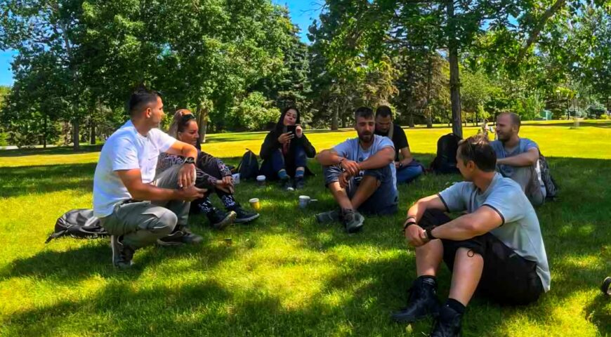 group-relaxing-in-park